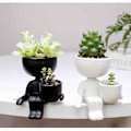 Miniatyrbillede 3 af 3: Keramisk Blomsterpot Portræt Blomsterpot Bord Sukkulent Kaktus Humanoid Vase Desktop Blomsterstand Sort Plantebeholder 6X6x10cm (Sort)