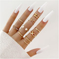 Miniatyrbild 1 av 4: Boho Pärl Infinity Knuckle Ring Set Lyckonummer 8 Våg Twist Knuckle Ringar Kostym Stapelbara Ringar för Kvinnor Flickor Män (Guld)