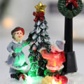Miniatyrbilde 2 av 4: Juledekorasjon, snøhus med fargerike blinkende LED-lys juleharpikshus mikrolandskap juledekorasjoner juletre