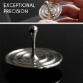 Miniatyrbild 1 av 2: Snurrande topp roterande magnetisk dekoration skrivbord droppar spiner leksaker presenter