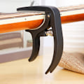 Miniatyrbilde 2 av 5: Nylon Stål Skyve Capo 4 Strenger 6 Strenger Akustisk Gitar For