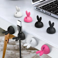 Pikkukuva 3 / 5: PCS/Kaapelin kääntäjä Luova Cartoon Rabbit Ear Shape Silikoninen itseliimautuva johdon järjestävä klipsi Työpöytä Pink