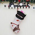 Miniatyrbild 3 av 4: Julklappspåse med julstrumpor, snögubbe, juldekoration