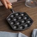 Miniatyrbild 3 av 6: Gjutjärn Bläckfiskbollar Gryta Kakform Fiskägg Ingen Beläggning Non-Stick Ägg Gryta Matlagning, Svart