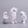 Miniatyrbillede 4 af 5: Astronaut Figurer Kagepynt Ydre Rum Kagedekoration Rummand Model Display Miniature Astronaut Legetøj Sæt 3 stk