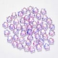 Pikkukuva 1 / 2: Spraymaalatut lasihelmet glittertähtipulverilla, lila, 8x8,5x4mm, reikä: 1mm