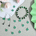 Pikkukuva 4 / 5: 1 Laatikko 60kpl Pyhän Patrickin päivän amuletteja Emaloidut neliapila-amuletit Vihreä shamrock-amuletti