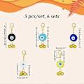 Miniatyrbillede 2 af 5: 30 stk. 5 Stilarter Ondt Øje Maskemarkør Gylden Lampwork Vedhæng Dekoration Maskemarkør Charms med Lås