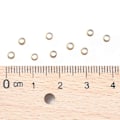 Pikkukuva 4 / 4: Tyhjiöpinnoitetut 304 ruostumattomasta teräksestä valmistetut välihelmet, pyöreät, kultaiset, 3x2mm, reikä: 1,6mm