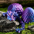 Miniatyrbild 4 av 5: 1 st 3D-tryckt drake med 1 drakägg, drakäggsset, fullt rörlig kristalldrakleksak, drakskrivbordsleksak med flexibel fog, kock-skrivbordsleksak (lila)