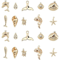 Miniatyrbillede 1 af 5: 1 Æske 20 stk. 10 Stilarter Ægte 18K Guldbelagte Ocean Tema Charms Havdyr Vedhæng Skal Søstjerne Delfin Fisk Skildpadde Dangles Bulk til DIY Ørering Ne