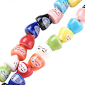 Miniatyrbillede 1 af 5: 1 streng Håndlavede Trykte Porcelænsperler Katteformet Charm Blandet Farve Spacer Perler Løse Perler Små Hul Perler til DIY Smykkefremstilling Omkring 40 stk./Streng