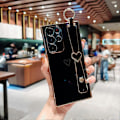 Miniatyrbilde 1 av 4: Etui til Samsung Galaxy S24 Ultra med håndleddsstropp og kickstand, kjærlighetshjertemønster, forgylt kant, myk TPU støtsikker deksel for kvinner Black For Galaxy S24 Ultra