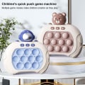 Pikkukuva 4 / 5: Pop Push It -peliohjain Bubble Sensory Fidget Toy Electronic Whack Console Brown  White