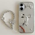 Til iPhone 16 Cover 3D Bowknot Spejl Overflade Design Telefon Bagside Cover med Rem