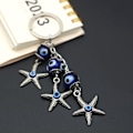 Miniatyrbillede 5 af 5: Lucky Starfish formet nøglering Devil Blue Eye nøglering bil nøglering charme gave