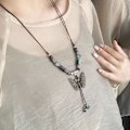 Pikkukuva 2 / 3: Perhoskaulakoru Boheemi Vintage Perhonen Punoksen Naru Pitkä Keraaminen Helmi Riippuva Kaulakoru Boho Etninen Hippi Korut Lahja Naisille