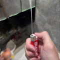 Miniatyrbilde 5 av 5: Simulert Mini Lighter Vannpistol Leke Morsomme Sprut Vannleker for Fester Spøker Green