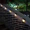 Miniatyrbillede 2 af 5: 4-pak Solcelled Dæklys LED Soltrappe Lys Vandafvisende Hække Lys Udendørs Trapper Trin Hæk Black Warm light