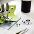 Miniatyrbillede 2 af 4: 6 stk. Spolehus Symaskine Spolehus Rustfrit Stål 6 Stk. Metalliske Spoler Indstillingsmaskine Til Maskiner med Frontmatning Klasse 15
