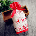 Miniatyrbilde 1 av 4: 50 stk julegaveposer med snøring Inkluderer 50 stk julegaveposer i plast med snøring, julegodteriposer for bursdag jul Holi