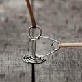 Miniatyrbilde 2 av 9: Strammer for telttau i rustfritt stål med karabinkroker.