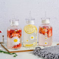 Miniatyrbilde 6 av 6: Søt vannflaske, matt glass vannflaske med sugerør, melkejuice glass vannflaske med skala, med 2 lokk, klar solsikke Clear Flower