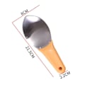 Pikkukuva 4 / 5: Mangon halkaisija, paloiteltu mango, leikkurit, mangon valmistustyökalu, mangon kaivamislusikat