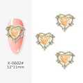 Miniatyrbillede 2 af 2: 3D hjerteformet neglevedhæng Valentinsdag 20 stykker metal legering hjerteformet negle rhinsten ædelstene 4 farver krystal diamant diy håndværk neglekunst