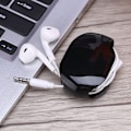 Miniatyrbild 1 av 2: Automatisk Kabeltrådsspole för Headset- och Hörlurstrådar Svart