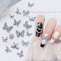 Miniatyrbild 7 av 7: 3D Silver Fjärils Nagelcharm, 12 st Legering Fjäril Nagelkonst Charm Glittrande Zirkon Nagelstenar Kristall för Naglar Dekoration Nagelkonst Nageltillbehör