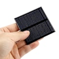 Miniatyrbillede 1 af 2: 0,7W 5V Mini Bærbar Solcellepanel DIY Strømmodul Oplader til 3,7V Batteri 70*70MM