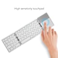 Miniatyrbild 7 av 8: Round Key Bluetooth Vikbart Tangentbord med Touchpad Universell 140mAh Trådlöst 64-tangenters Vikbart Tangentbord Silver