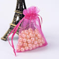 Miniatyrbillede 2 af 2: 50 st. Handsydda Fuxia Organza påsar c.a 7x9 cm.