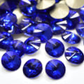 Miniatyrbild 5 av 11: 100 koniska Swarovski kristaller för inlägg Ø 6 mm Röda 7 Röd