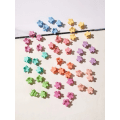 Miniatyrbild 1 av 3: Pack med 50 st. Små blomformade Hårklämmor 14x14 mm