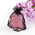 Pikkukuva 1 / 2: 10 st.Handsydda Svarta organza påsar c.a 7x9 cm.