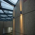 Miniatyrbild 3 av 5: Sienna Up Down Utomhusvägglampa Matt Svart, Transparent Glas IP44
