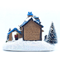 Miniatyrbillede 1 af 2: Julelandsbyhus med LED-lys i resin, samlerobjekt, julescene, landsbyhus, ornament, dekoration, gaver