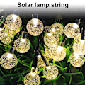 Miniatyrbillede 2 af 4: Solcelledækkede LED-lysstrenge med kugleformede lamper - 30 LED, 8 lysfunktioner