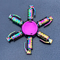 Miniatyrbild 1 av 9: Metallisk Färgglad Legering Fingertopp Gyro Fingerrotation Användbar Verktyg för Tryckreducering Colorful Smoke Bomb 146