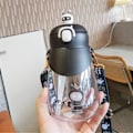 Pikkukuva 1 / 7: Vedenkeitin iso vauva oljella juomapullo 1000ML musta