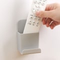 Miniatyrbilde 1 av 9: Veggmontert TV-fjernkontrollholder