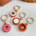Miniatyrbillede 4 af 5: 3D Mode Sød Chokolade Donuts Dessert Silikone Cover Til Apple Airtag Etui Med Nøglering Holder Anti-tab Stødsikkert Beskyttelsescover Til Airt