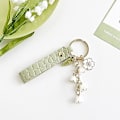 Miniatyrbillede 2 af 5: Nukaf Lily Of The Valley Design Blomster Nøgleringe Læderpung Bil Nøglering Til Kvinder Piger Gaver