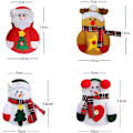 Miniatyrbillede 2 af 5: 4 stk. Bestikholder i sød julemandskostumeform