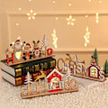 Miniatyrbillede 3 af 5: Lysende juledekorationer i udhulet træ