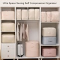 Miniatyrbild 5 av 5: Ultra Space Saving Självkomprimerande Organiseringsväska, Packpåsar för Dunjacka, Täcke, Kläder, Filtar (Blå, L för Kläder)