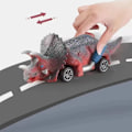 Pikkukuva 3 / 3: Dinosaurusauto vetää taakse (4 autoa)