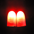 Miniatyrbillede 1 af 2: 2 Røde Magiske Finger Lys Op Tommelfinger Tips Led Finger Lampe Tommelfingre Lys Fest Magiske Tricks